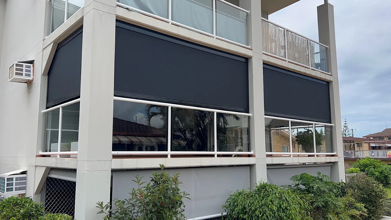 Outdoor blinds installed on a modern multi-storey home